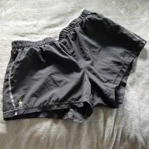 Smartwool running shorts.